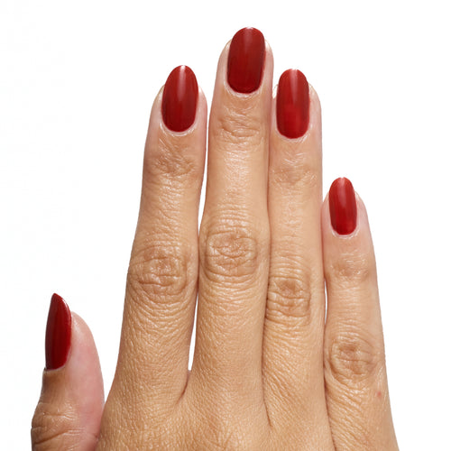 Flat hand wearing A Little Rusty Forever Wear polish